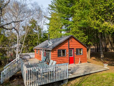 cottages for sale manitouwabing  Stunning waterfront home on large Lake Manitouwabing with double car garage